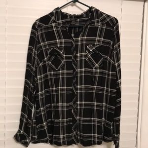 Cute black and white plaid shirt.